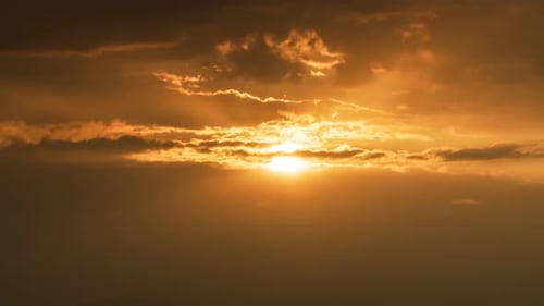 Impressive Sunset Through The Clouds