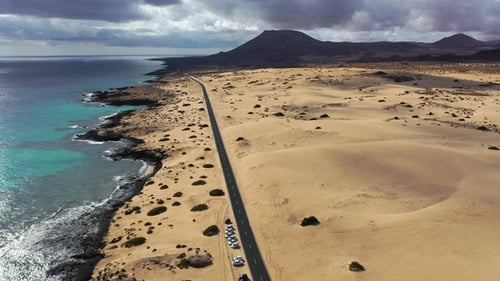 A road in the desert. Sand and outdoor road travel and journey. Freedom for transport and travel.