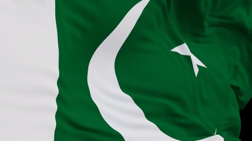 The Pakistan flag with alpha channel waving in the wind in slow motion