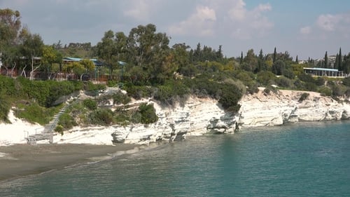 Picturesque seashore. Nature. Beautiful beach. Turquoise sea water and rocky shore. Marine landscape