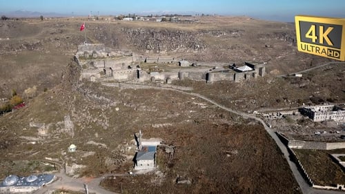 Top Of The Hill With Ancient Kars Fortress, Turkish Flag ,City View , Aerial Shot 11