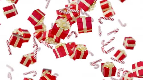 Fallende Weihnachtssüßigkeiten und Geschenkboxen