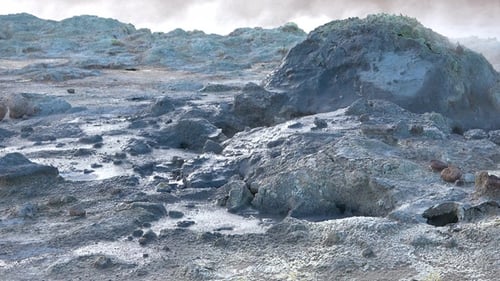 Geothermal area. Boiling hot geothermal volcanic mud pool, closeup shot steamy lake bubbling mud.