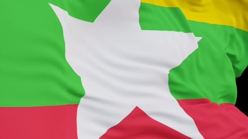 The Myanmar flag with alpha channel waving in the wind in slow motion