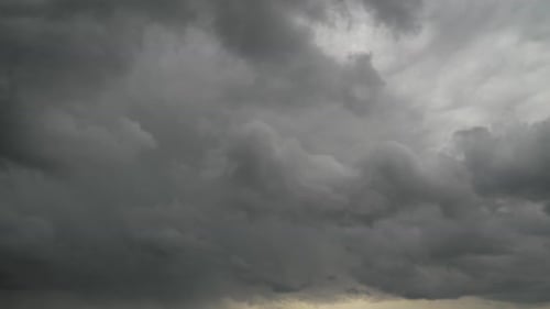 Dramatic Clouds Billowing Across a Gray Sky