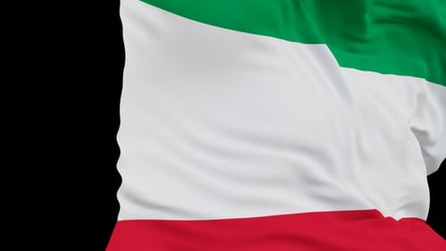 The Kuwait with alpha channel waving in the wind in slow motion