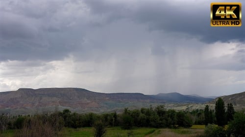 Rain Clouds Over Mountains