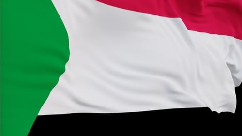 The Sudan flag with alpha channel waving in the wind in slow motion