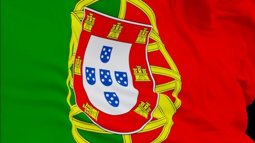 The Portuga flag with alpha channel waving in the wind in slow motion