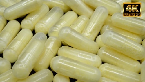 Yellow Vitamin Capsules Macro