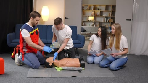 CPR Training with Mannequin in a Home Setting