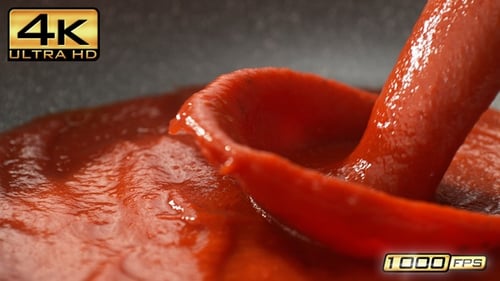 Tomato Sauce Pouring into Pan with Passata - Preparing Pizza Sauce or Italian Spaghetti Bolognese