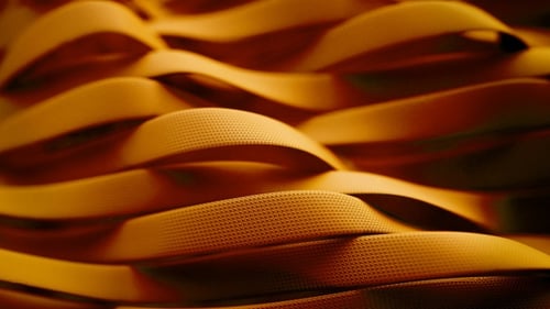 Abstract 3D Golden Textured Ribbons Waving in Smooth Motion