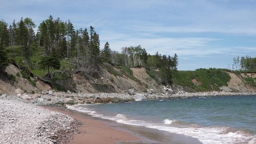 Picturesque seashore. Nature. Beautiful beach. Turquoise sea water and rocky shore. Marine landscape