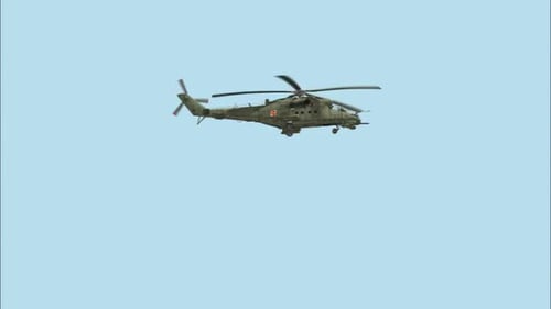 Military Helicopter Flying Isolated on Transparent Background