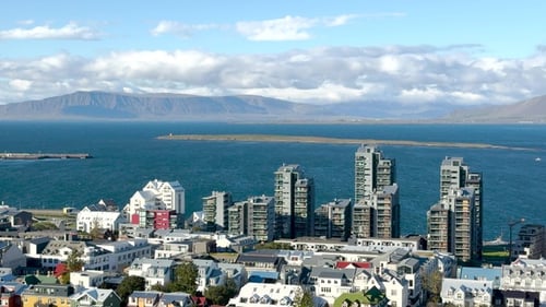 Exploring the vibrant cityscape of Reykjavik with stunning waterfront views.
