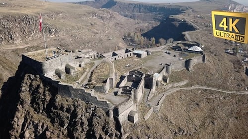 Top Of The Hill With Ancient Kars Fortress,Turkish Flag,Main City View Aerial Shot