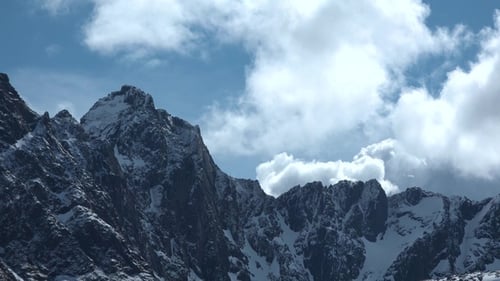 Mountain landscape timelapse moving clouds. Blue sky in the clouds, cloud formation, Norway.