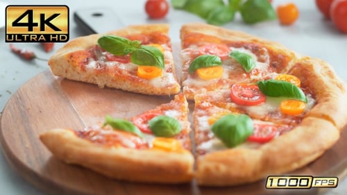 Pizza Margherita Slices Disappearing From A Wooden Serving Board - Table Top View, Stop Motion