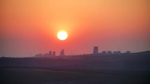 8K Sunset Through City Skyscrapers