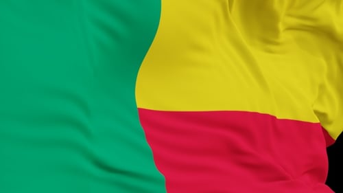 The Benin flag with alpha channel waving in the wind in slow motion