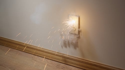 Electrical Outlet Sparking and Smoking on Wall
