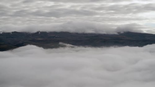 Mountains Covered in Clouds Aerial View