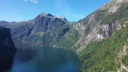 Aerial view of a picturesque fjord in Norway. Drone Aerial View of Mountain and Fjord channels.