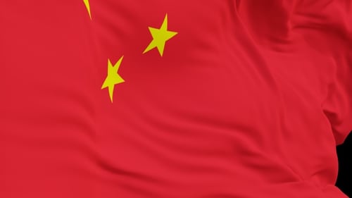 The China flag with alpha channel waving in the wind in slow motion