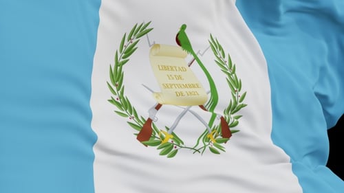 The Guatemala flag with alpha channel waving in the wind in slow motion