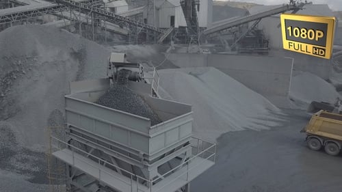 Industrial Gravel Production with Machinery and Trucks