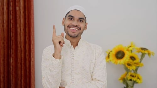 Man in Tunic Thinks and Speaks