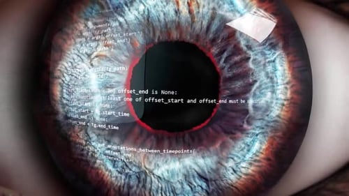 Human Iris Expanding While Looking at Code