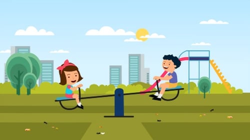 Happy Kids playing Seesaw in the park