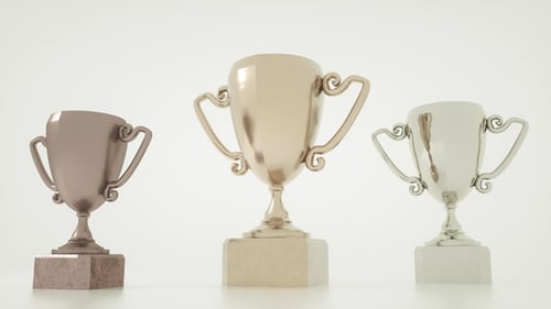 Gold, Silver, and Bronze Trophies - Elegant Award Cups on White Background