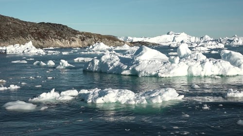 Icebergs Float on the Ocean in the Arctic