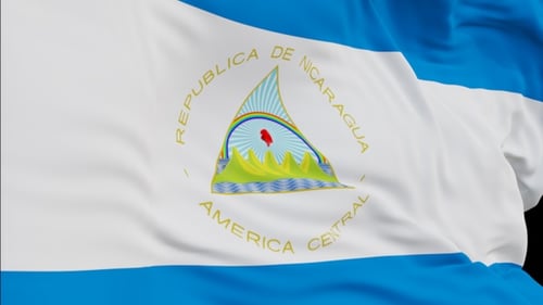 The Nicaragua flag with alpha channel waving in the wind in slow motion