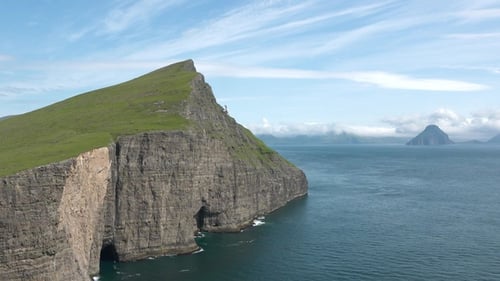Coastal cliffs of remote islands. Breathtaking views of the vast ocean and dramatic landscapes.