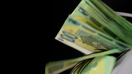 Machine Counting Stack of Euro Bills Close Up