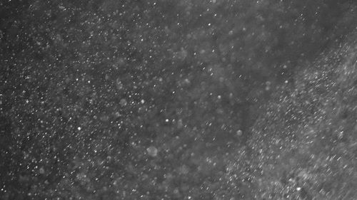 Water Particles Glistening Abstract Background