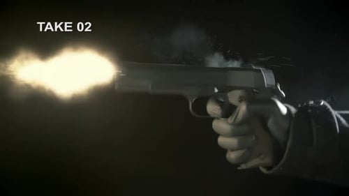 Gloved Hand Firmly Gripping a Black Gun