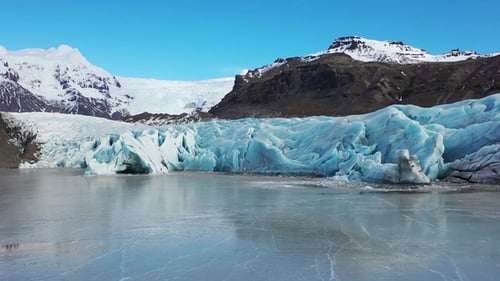 Glacier nearby. Aerial: Close up of Largest Glacier in Europe. Global warming concept. Drone outdoor