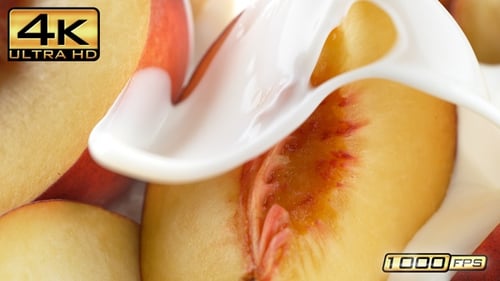 Peach Slices with Yogurt Pouring Over, Macro Shot