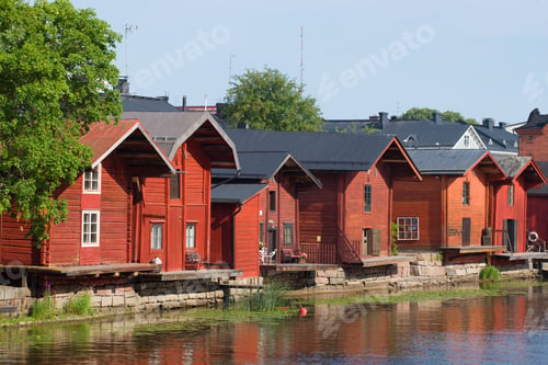 Preview: Old-Time Red Wooden Barns On The Porvonjoki River On A Sunny July Afternoon. Porvoo, Finland