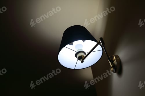 Preview: View Of Lighted Lamp On Corridor Wall