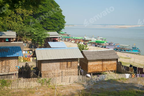 Preview: Traditional Burmese Houses On The Bank Of The Irrawaddy River. Mingun, Myanmar