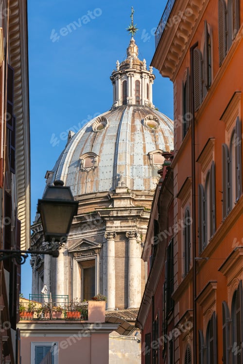 Preview: View Of The Tiled Roof Of The Old Cathedral Against The Blue Sky. Rome. Italy.