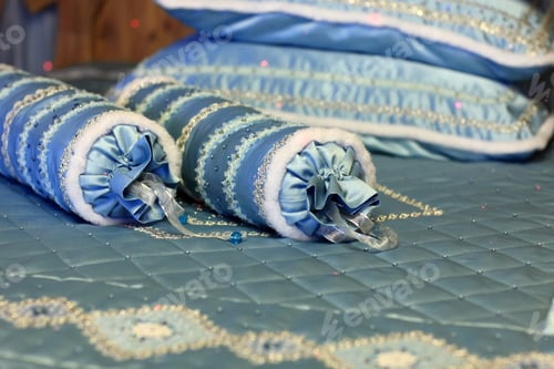 Preview: Details Of A Bed With A Blue Blanket
