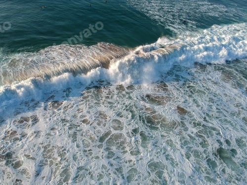 Preview: Aerial View From A Big Wave Crashing In A Beach. Drone View