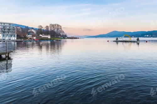Preview: Last Lights Of The Sunset In Velden. Reflections On The Water And Christmas Atmosphere. Austria.